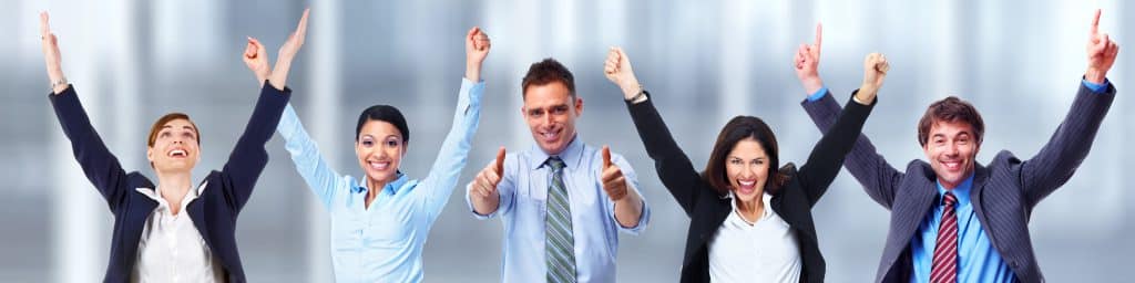 Group of young business people over blue office background.